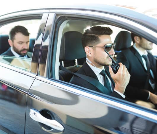 Executive protection detail in transit
